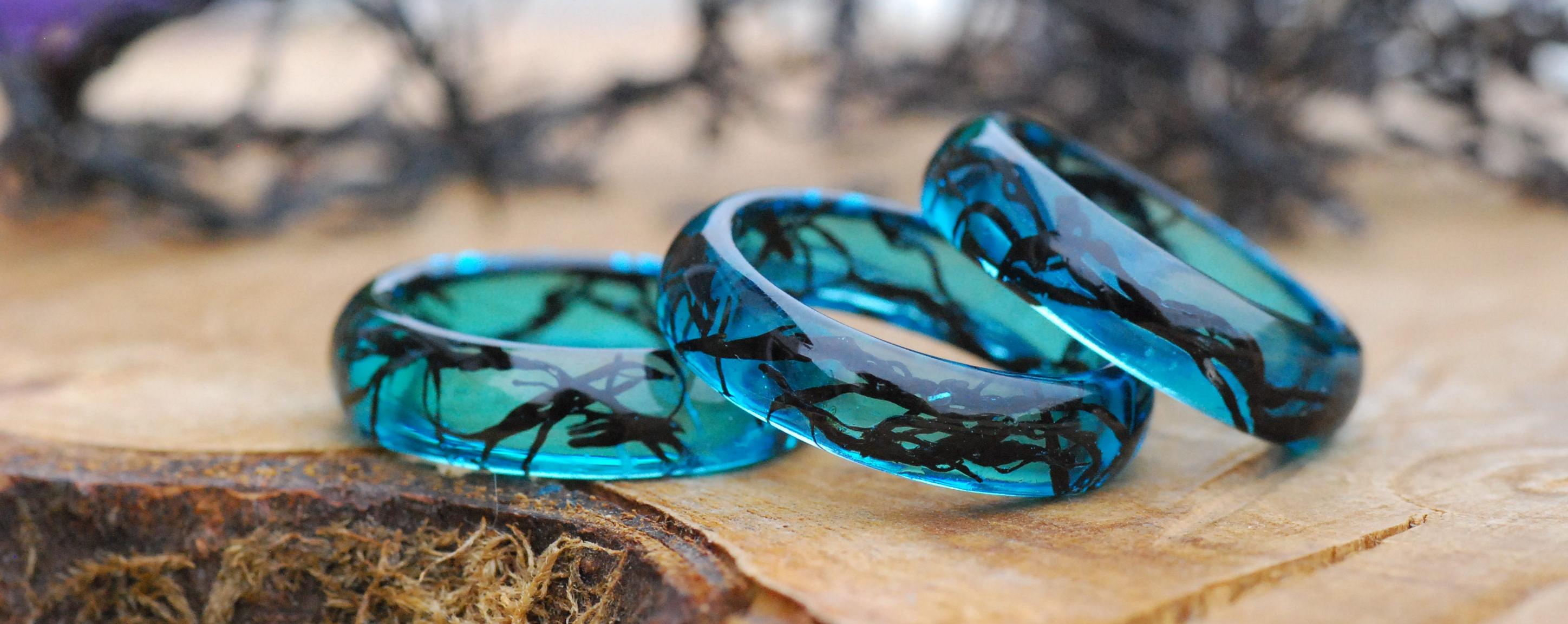 three mermaid blue and black algae resin rings