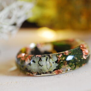fairy ring with dark moss lichens and rustic copper