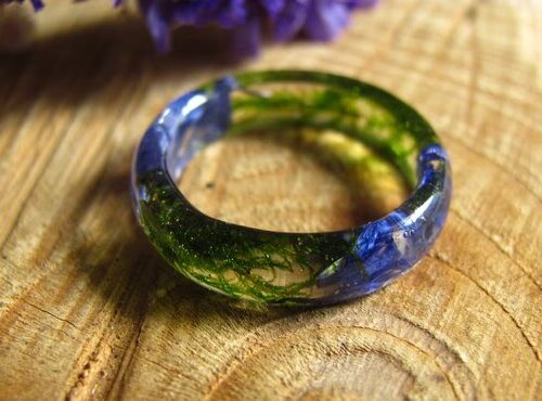 Fairy blue pressed flowers with green moss in crystal resin ring