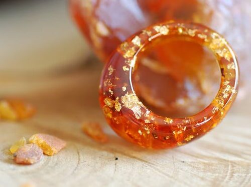 Top look at Statement and bold amber baltic ring with real 24k gold flakes in orange dyed resin.