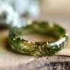 foresty ring full of moss and gold flakes