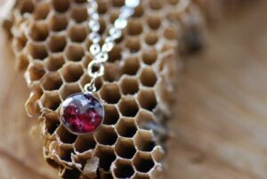 close up sterling silver and garnet stone bracelet