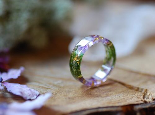 resin ring made with amethyst moss and gold flakes