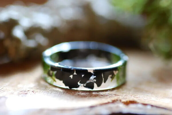 Black tourmaline and green moss resin ring with silver flakes