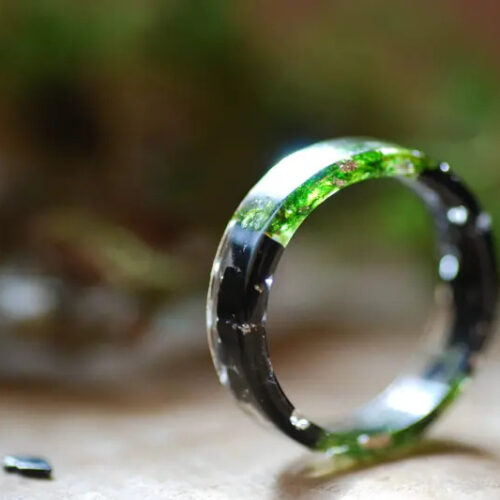 Black tourmaline and green moss resin ring with silver flakes