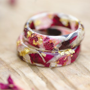 two resin rings made of rose petals white flower and gold