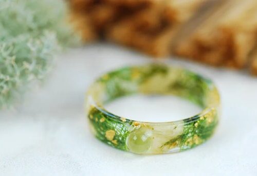 front look at green peridot and jasmin ring