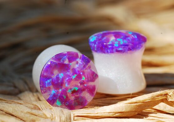 Front look at purple opal ear plugs