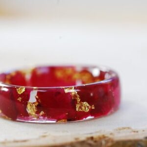 side view of ring made with red rose petals and 24k gold