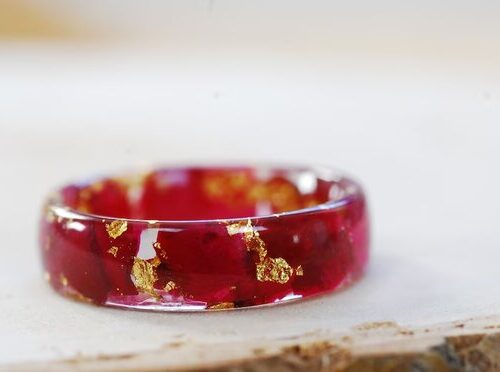 side view of ring made with red rose petals and 24k gold