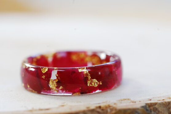 side view of ring made with red rose petals and 24k gold