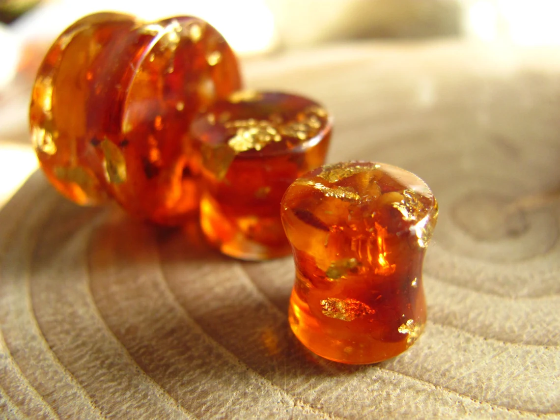 real amber and 24k gold ear plugs