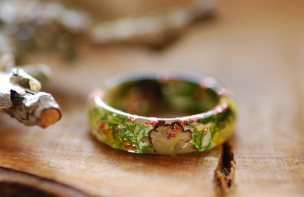 top view nature resin ring made with moss lichens and copper