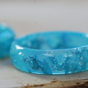 close up of blue pastel faceted resin ring