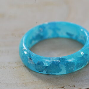 top look of two blue resin rings