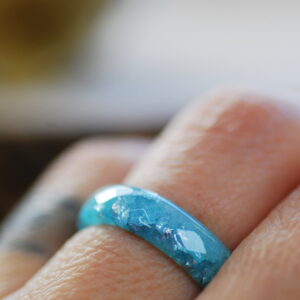  blue pastel color with gold flakes resin ring on finger