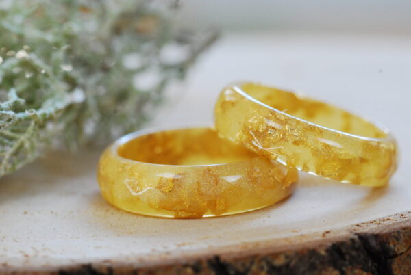 two minimalist gold resin rings