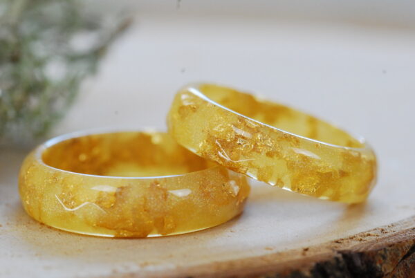 two simple but trendy gold pastel resin rings