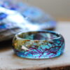 blue sea resin ring with algae