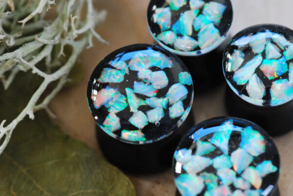 Iridescent white opal ear plugs front view