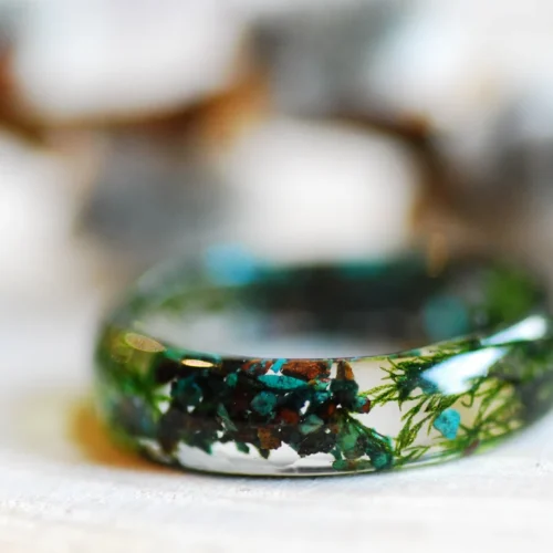 Earthy ring made of chrysocolla and jade gemstones with green moss and metallic flakes