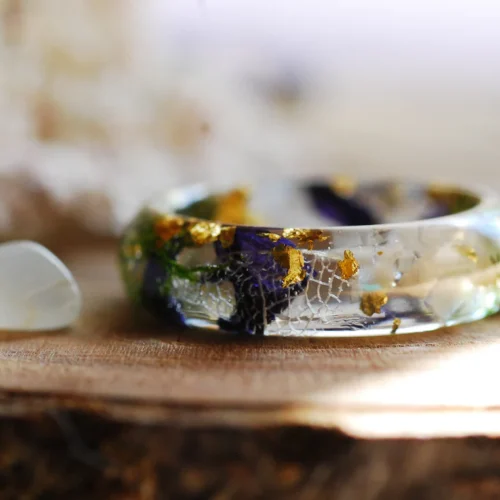 white moonstone ring with purple mallow and green moss