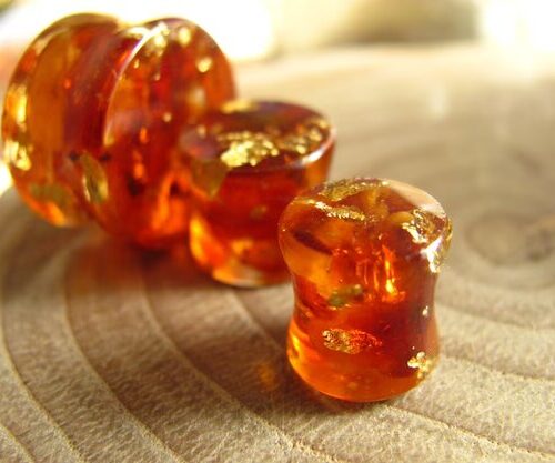 real amber and 24k gold ear plugs