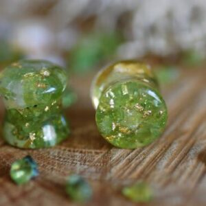 fantastic bland of green and yellow stones in resin gauges