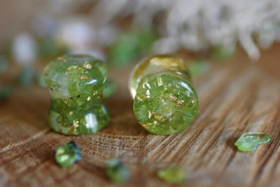 fantastic bland of green and yellow stones in resin gauges