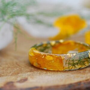 colorful ring with yellow and green flowers