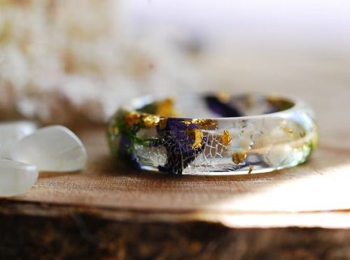 white moonstone ring with purple mallow and green moss