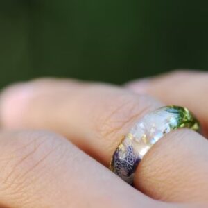 moonstone mallow moss and gold ring on finger