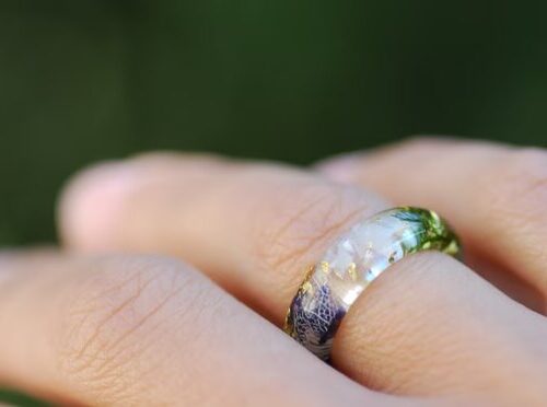 moonstone mallow moss and gold ring on finger