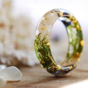 delicate and chick moonstone and moss ring