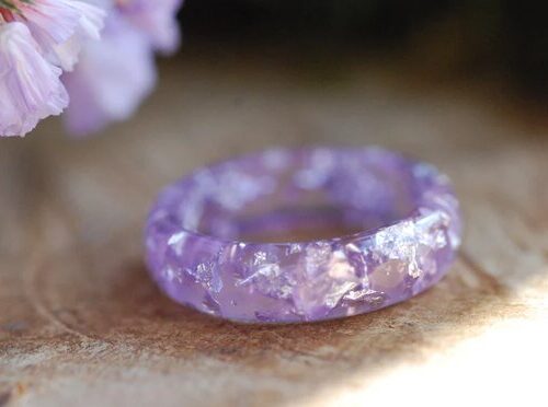 Lavender color ring faceted with silver flakes