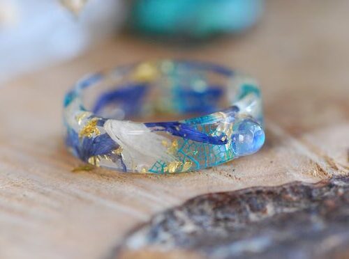 Rainbow moonstone ring with blue and white cornflowers