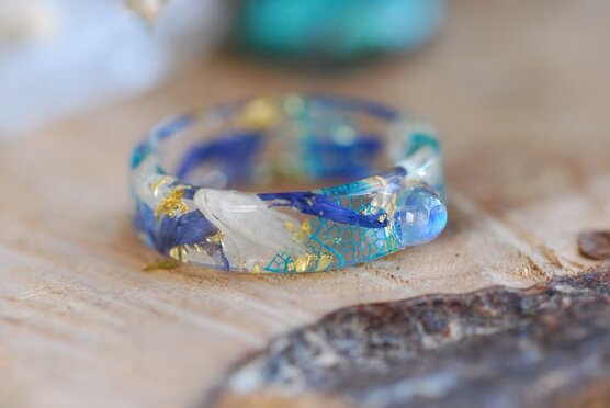 Rainbow moonstone ring with blue and white cornflowers