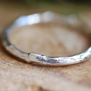 close up of stacking melted silver ring