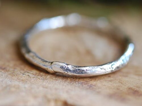 close up of stacking melted silver ring