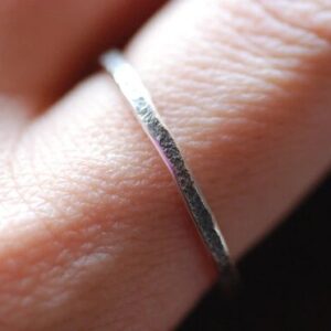 rustic tiny sterling silver ring on finger