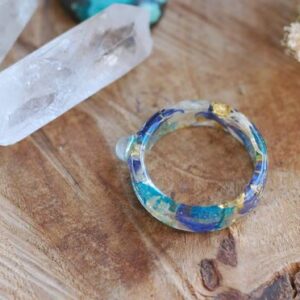peace and harmony ring with rainbow moonstone in blue white colors