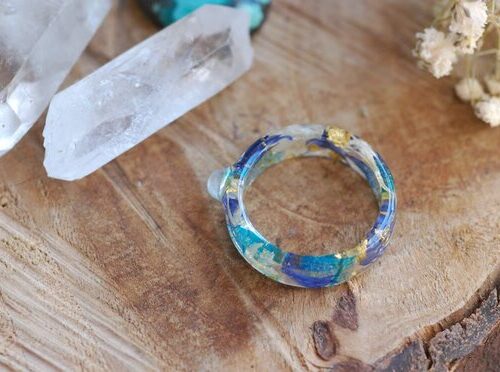 peace and harmony ring with rainbow moonstone in blue white colors