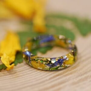 uplifting floral resin ring