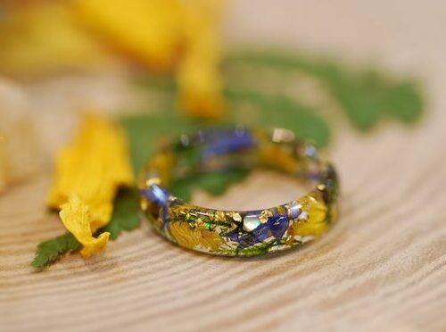 uplifting floral resin ring