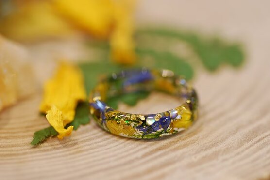 uplifting floral resin ring