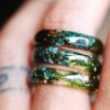 chrysocolla jade and moss ring on finger