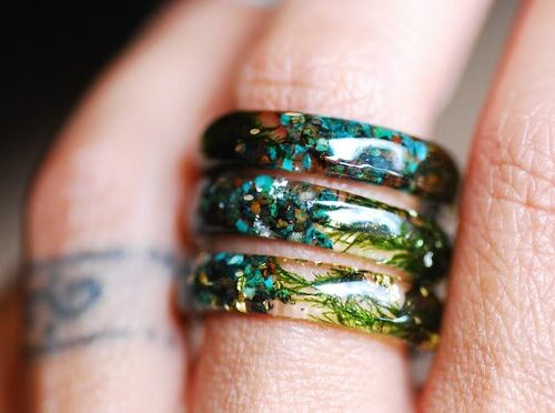 chrysocolla jade and moss ring on finger