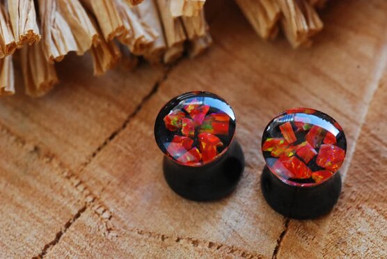 top view red opal black plugs