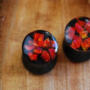 pair of red fire opal gauges
