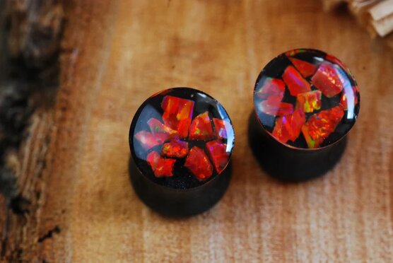 pair of red fire opal gauges